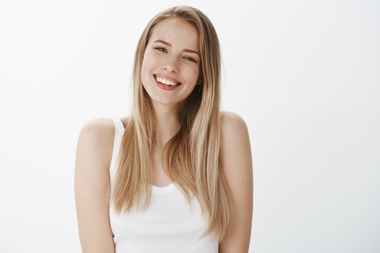 A cheerful woman with a kind smile
