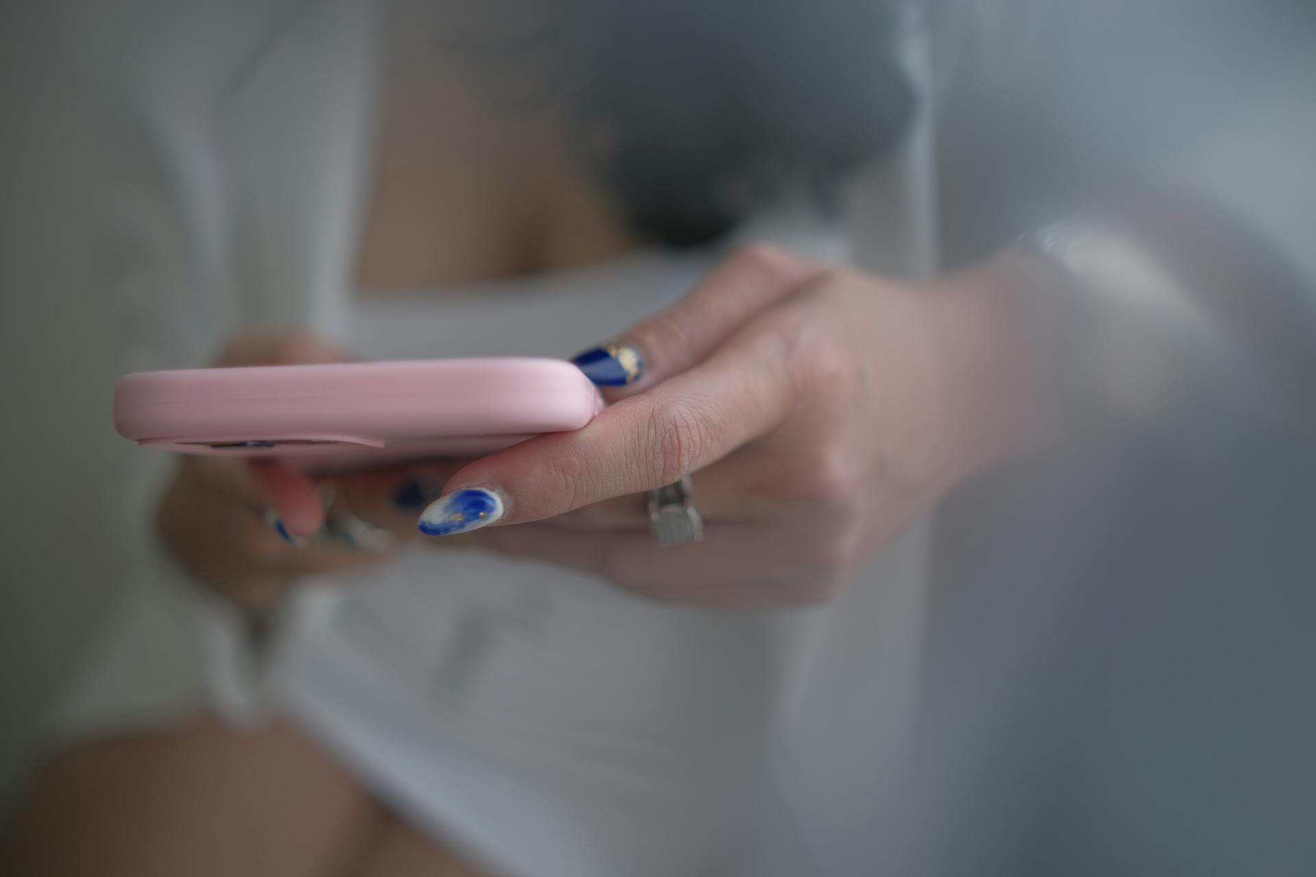 A woman holding her phone