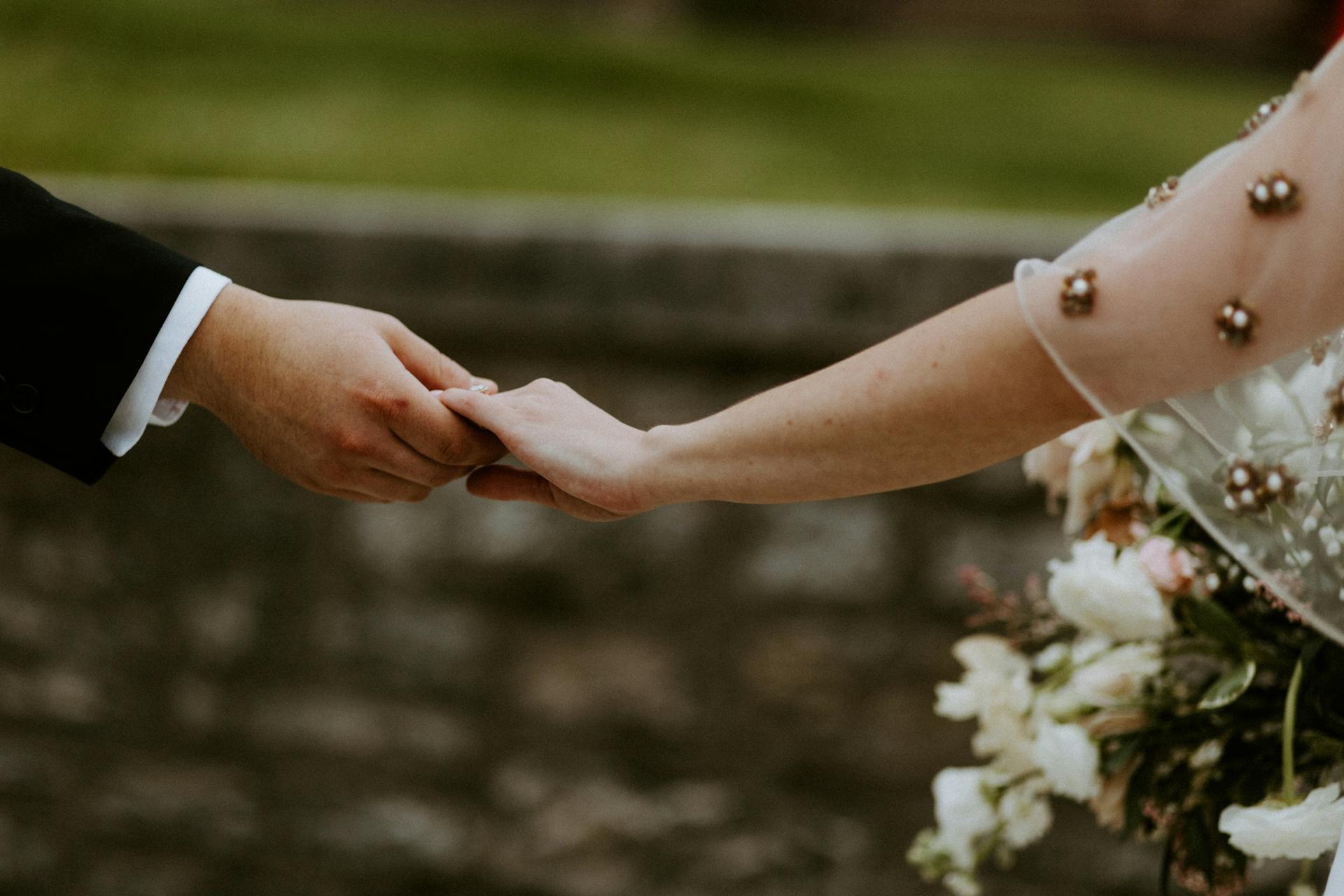 Couple holding hands